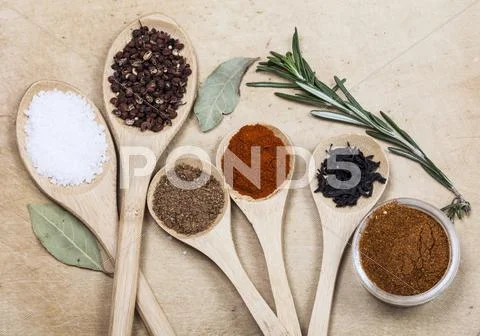 Spices On Wooden Spoons