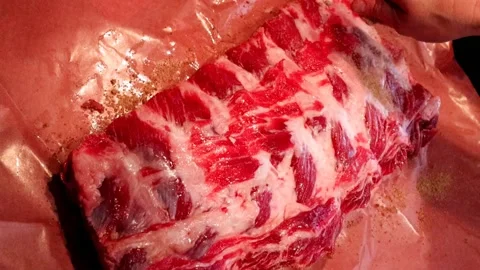 Spicing Beef Ribs Stock Footage 133369507