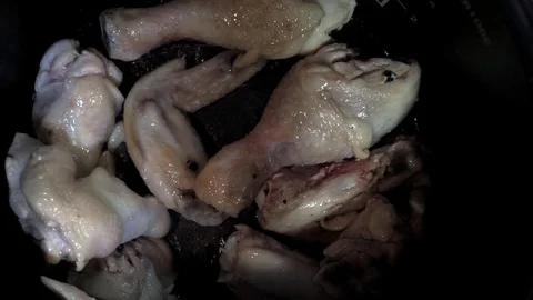 Spicing chicken thighs Stock Footage 101967203