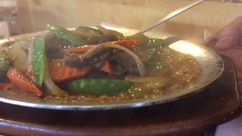 Spicy Beef Vegetable in Hot Pan Stock Footage 121936688