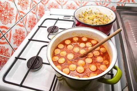 Spicy egg soup and risotto on the stove ready to serve for lunch Stock Photos