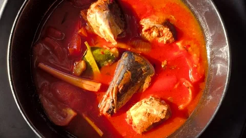Spicy fish soup or Tom Yum in bowl, in door  Chiangmai  Thailand. Stock Footage 294963495