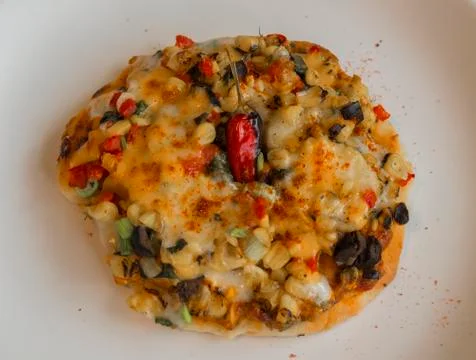 Spicy mini pizza. Stock Photos