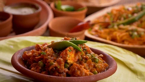 Spicy Paneer(soft cheese) Chilli Curry served in a clay bowl 動画素材 111412141
