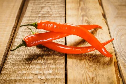 Spicy peppers on the table Stock Photos