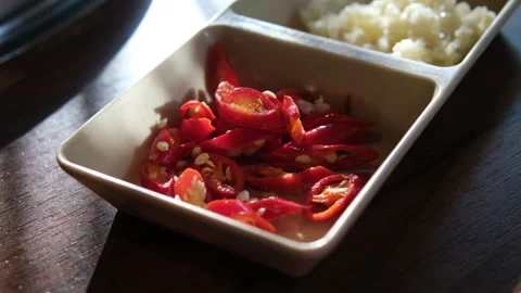 Spicy red chilli - cut and cook with chilli to make cuisine dishes spicy - Stock Footage 309530281