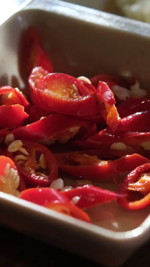 Spicy red chilli - cut and cook with chilli to make cuisine dishes spicy - Stock Footage 310429045