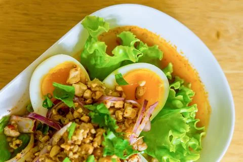 Spicy salad with boiled egg Fotos Stock