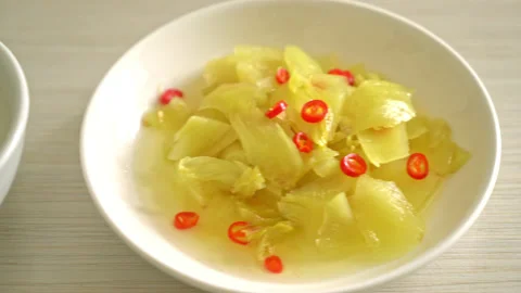 Spicy salad pickle cabbage or celery with sesame oil - Asian food style Stock Footage 160451054
