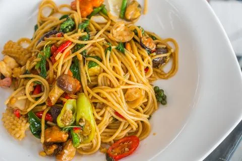 Spicy spaghetti with seafood . Stock Photos