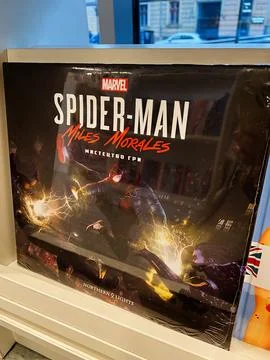 Spider-Man Miles Morales: Dynamic City Action Cover Art for the Marvel Vide.. Stockfoto's