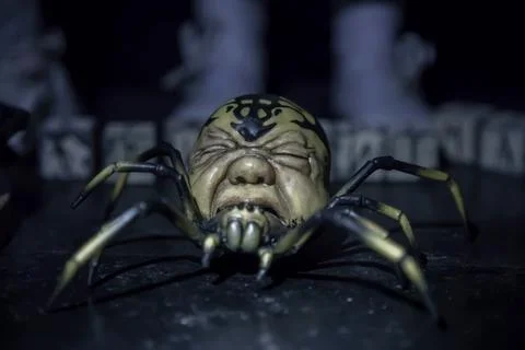 Spider monster with a human head. Stock Photos