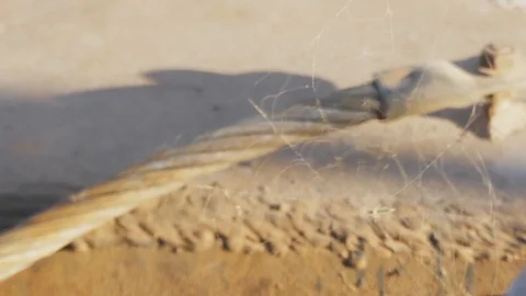 Spider Web on a Dock Gently Blowing in the Breeze at Sunset Stock-Footage 114626010
