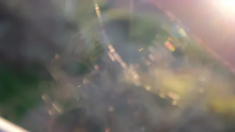Spider web shining in the sunlight zoom in Stock Footage 130222307