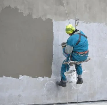 Spiderman at work on the house Stock Photos