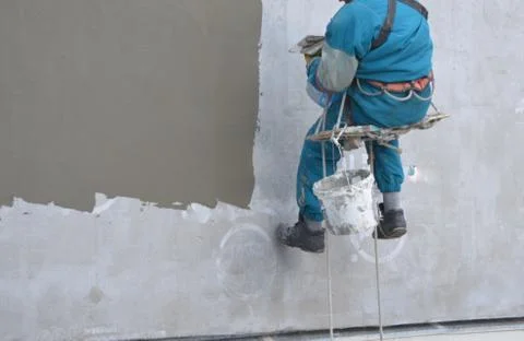 Spiderman at work on the house Stock Photos