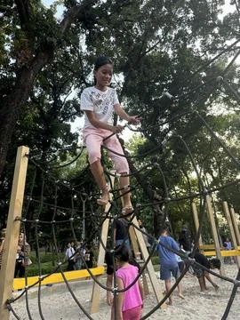 Spiderweb climb at the playground Foto stock