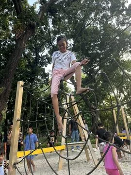Spiderweb climb at the playground Stock Photos