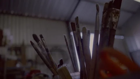 Spiderwebs on old paintbrushes in the workshop Stock Footage 278990674
