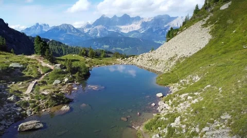 Spiegelsee with beautiful reflection of the Dachstein massif Stock Footage 249625853