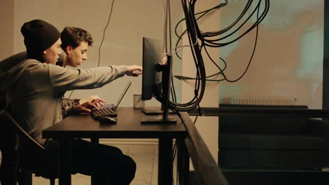 Spies team committing cryptojacking and cyberwarfare 스톡 동영상 228887589
