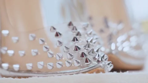 Spiked clear stiletto high heels for alternative bridal fashion Stock Footage 340283589