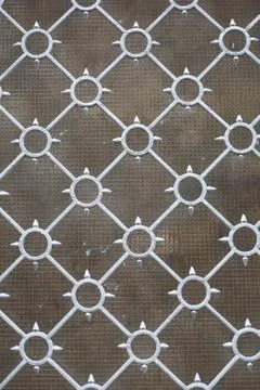 Spiked Window Bars Background Stock Photos