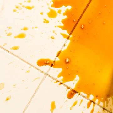 Spilled coffee on the floor Stock Photos