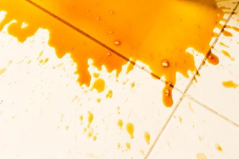 Spilled coffee on the floor Foto stock