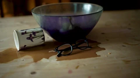 Spilled coffee on a wooden table Stock Footage 152735824