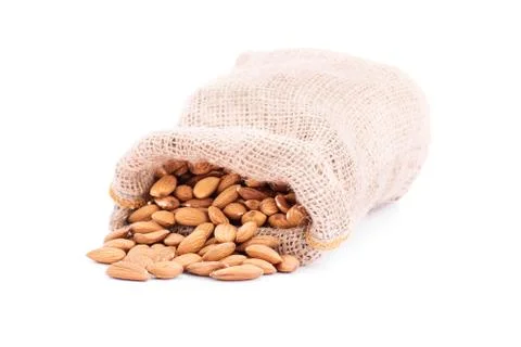 Spilled sack of almonds Stock Photos