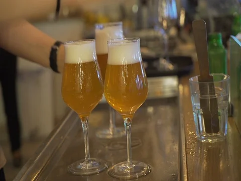 Spilling beer in glasses Stock Footage 81118891