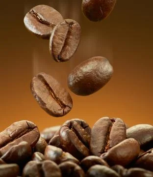 Spilling coffee beans Stock Photos