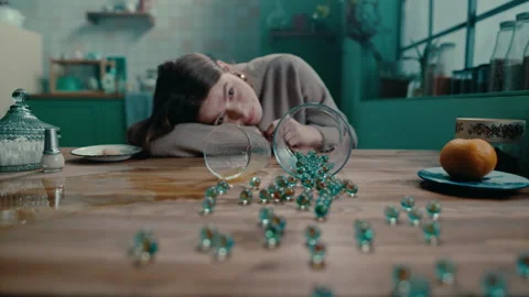 Spilling Marbles over the table Stock Footage 274983680