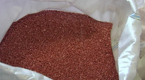 Spilling of red plastic granules, HD 1080p Stock Footage 37098646