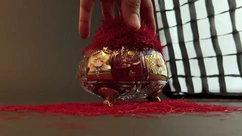 Spilling saffron threads in a crystal container Stock Footage 171235503