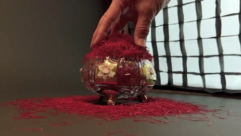 Spilling saffron threads in a crystal container Stock Footage 171235629