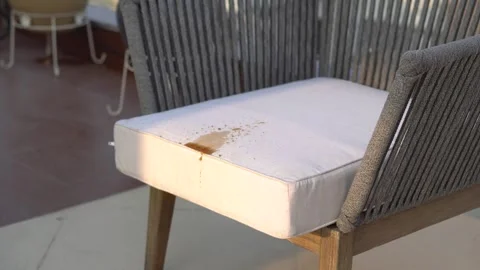 Spilling wine on sofa and cleaning it with water Stock Footage 245473836