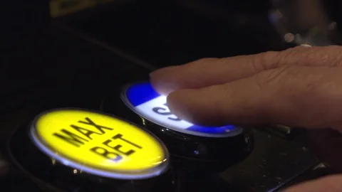 Spin button pressed on slot machine by hand 4k Stock Footage 110890655