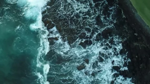 Spin Fall Into Ocean Aerial 4k Drone Video stock 256683534