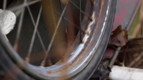 Spin old rusty spoked wheel 動画素材 56747937