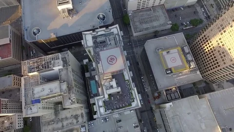 Spin view from drone of sky scrapers rooftops in Los Angeles Stock Footage 73719485