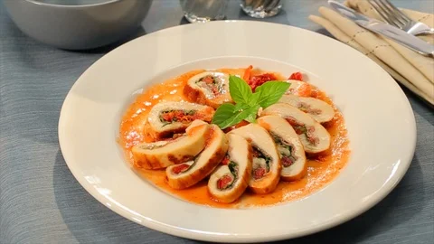 Spinach and bacon stuffed chicken on plate Stock Footage 102136187