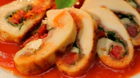 Spinach and bacon stuffed chicken on plate. Super CU Stock Footage 102136307