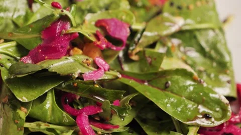 Spinach and pickled cabbage salad dressed with vinegar sauce. Healthy food. Stock Footage 302627246