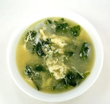 Spinach egg drop soup Stock Photos