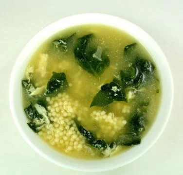 Spinach egg drop soup Stock Photos