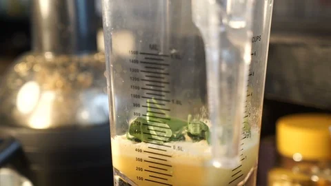Spinach Falls Into Blender By Hand Stock Footage 87454816