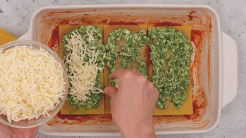 Spinach lasagna recipe. A layer of mozzarella cheese Stock-Footage 170031069
