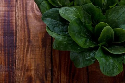 Spinach leaves in a basket Stock Photos